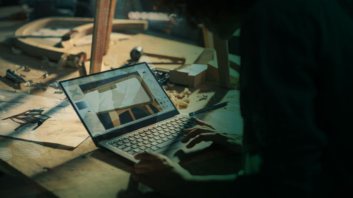 Carpenter on the computer going through data